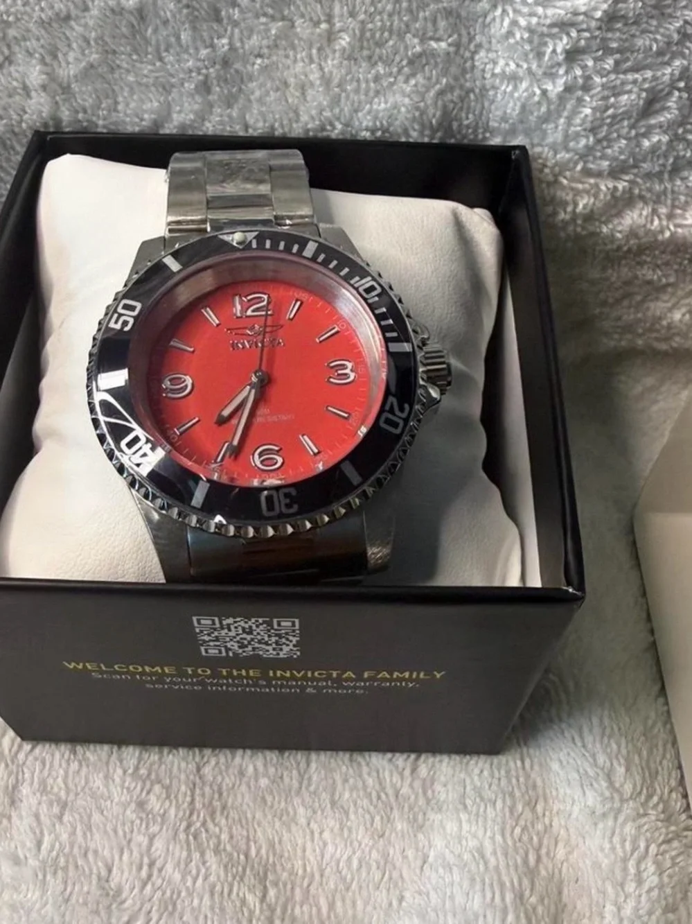 Invicta Silver Watch with Red Dial and Black Bezel